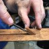 The old truss rod is buried in the neck under a glued in wooden strip