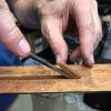 The old truss rod is buried in the neck under a glued in wooden strip